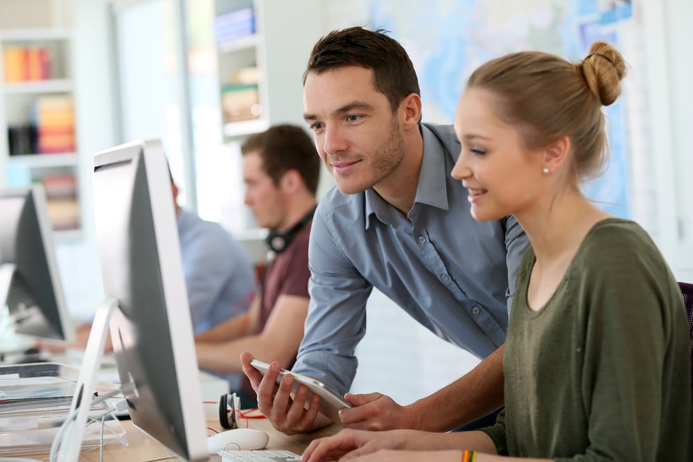 Colleagues utilizing AI within their ERP system to increase overall effectiveness.