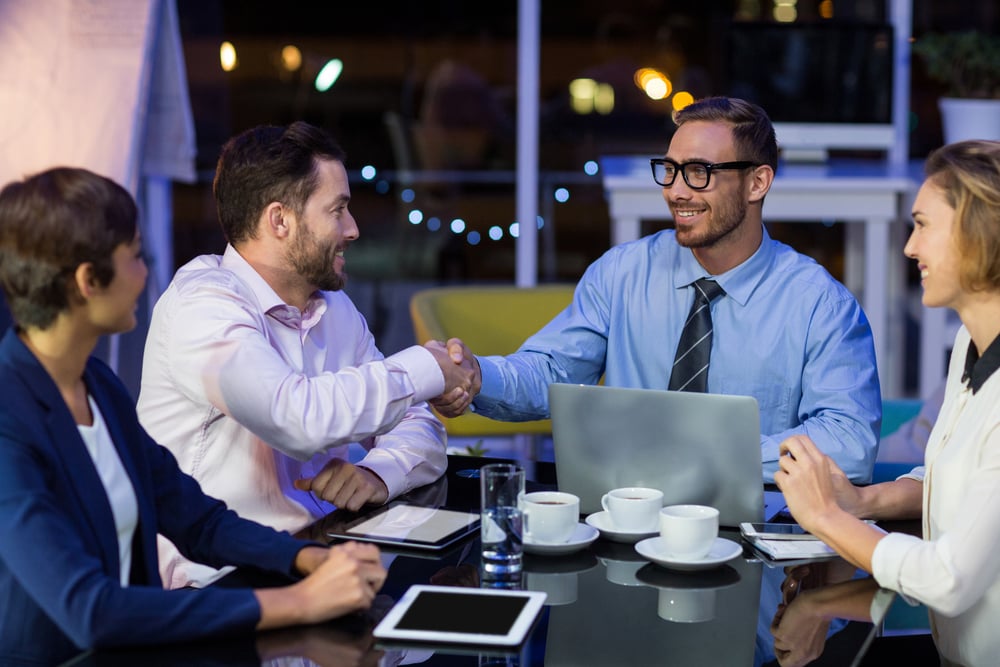 Coworkers delighted after deciding which software platform fits their B2B eCommerce business.