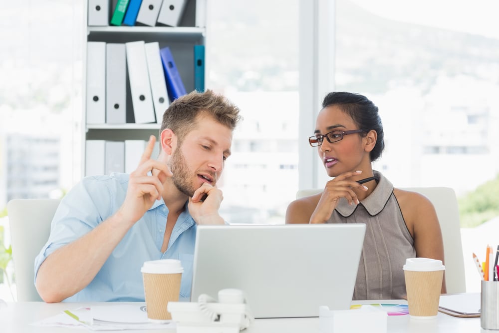 Coworkers discussing the benefits and drawbacks of their NetSuite ERP solution vs switching to Acumatica cloud ERP.